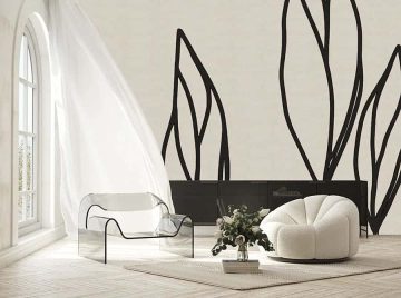 papier peint feuillage sur lin situation dans un salon avec 2 fauteuils modernes dans les couleurs beiges et noirs